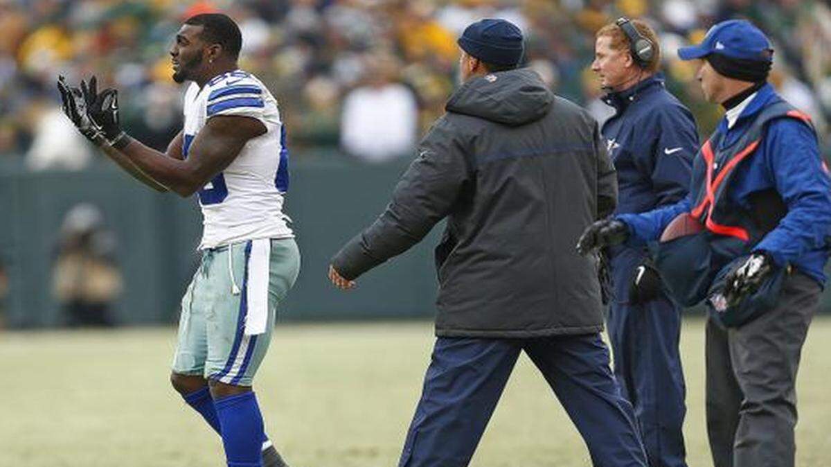 
Dallas Cowboys wide receiver Dez Bryant (88) protests an official’s call late in the fourth quarter. The play was ruled a catch but was overturned via instant replay. 
