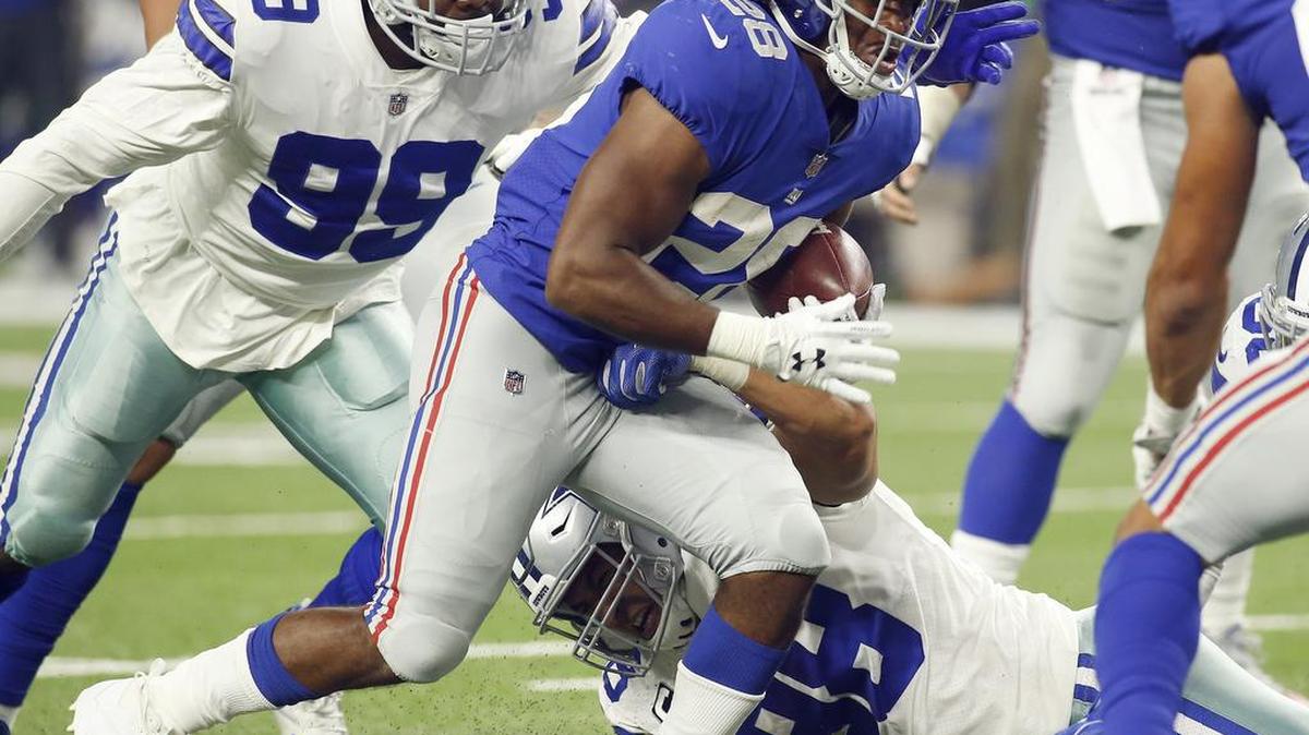 The Dallas Cowboys made defensive end Charles Tapper, left, inactive for Monday’s game against Arizona.