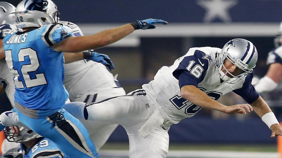 Dallas Cowboys quarterback Matt Cassel (16) flies backward after being hit by Carolina Panthers defensive back Colin Jones (42) on a throw in the second half on Thanksgiving. Cassel says his comfort level is better going into his fifth start of the season.