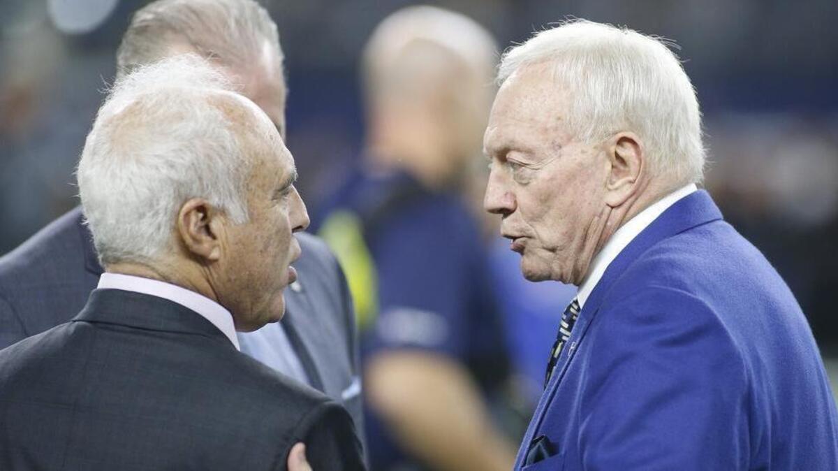 Cowboys owner Jerry Jones, right, with Eagles counterpart Jeffrey Lurie before the game in Arlington last season, is impressed with Philadelphia reaching the Super Bowl. “Frankly, I wish them well,” he said.