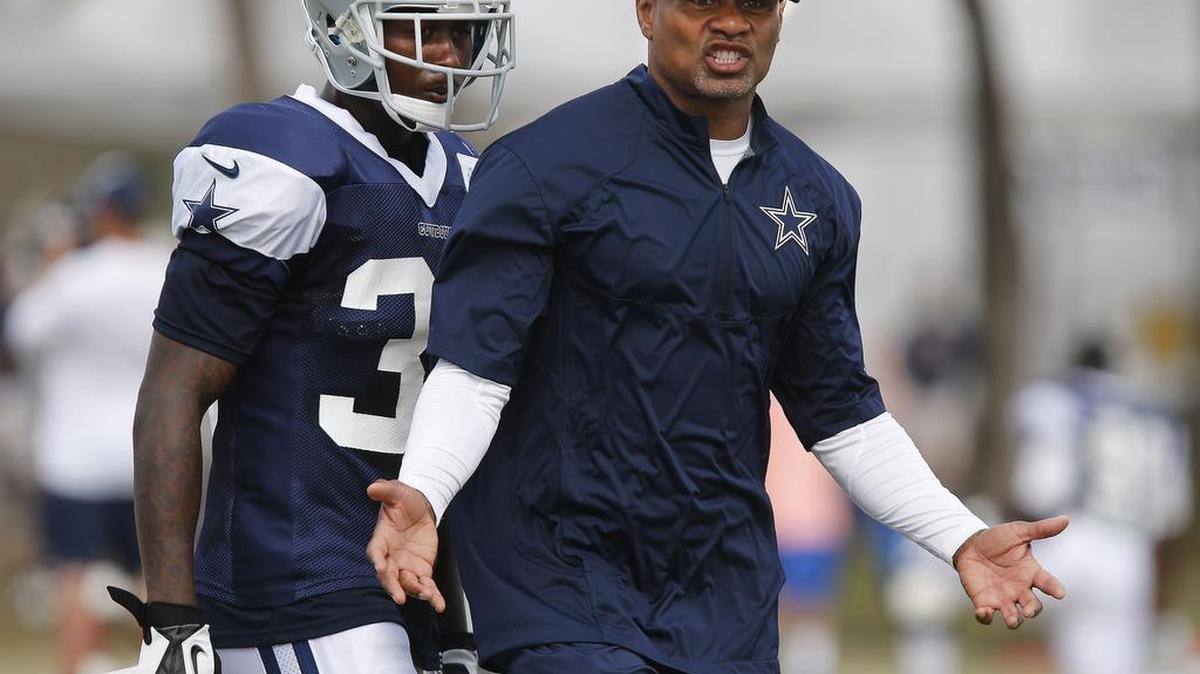 Jerome Henderson, right, spent four seasons as a Cowboys assistant coach before leaving for Atlanta, where he is the Falcons defensive passing game coordinator.