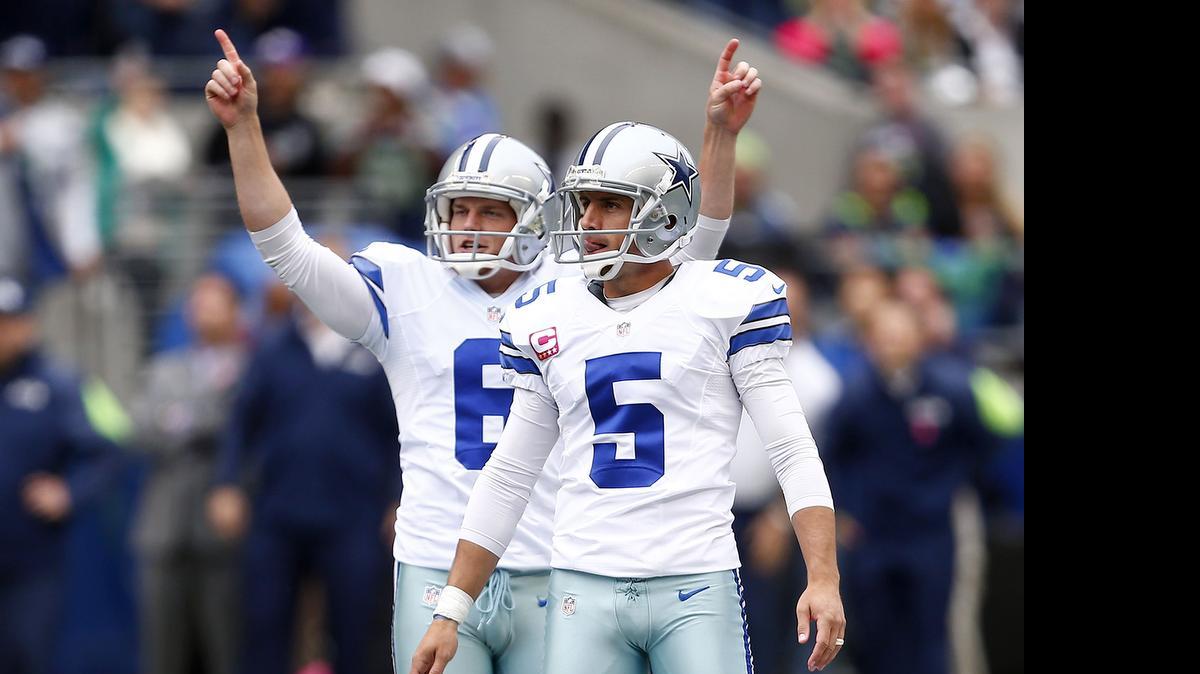 
Dan Bailey (5) celebrates another successful kick with his holder, Chris Jones, but now must adjust to the league’s new PAT rule.
