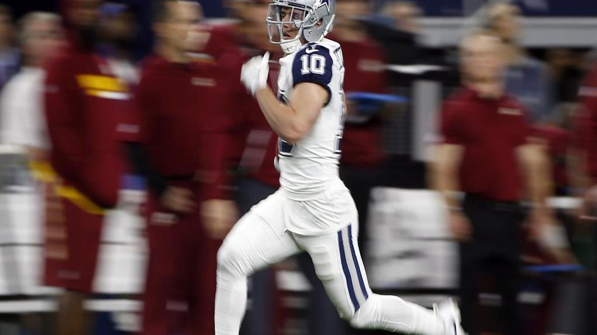 Dallas Cowboys wide receiver Ryan Switzer returns a Washington Redskins punt 83 yards for a touchdown.