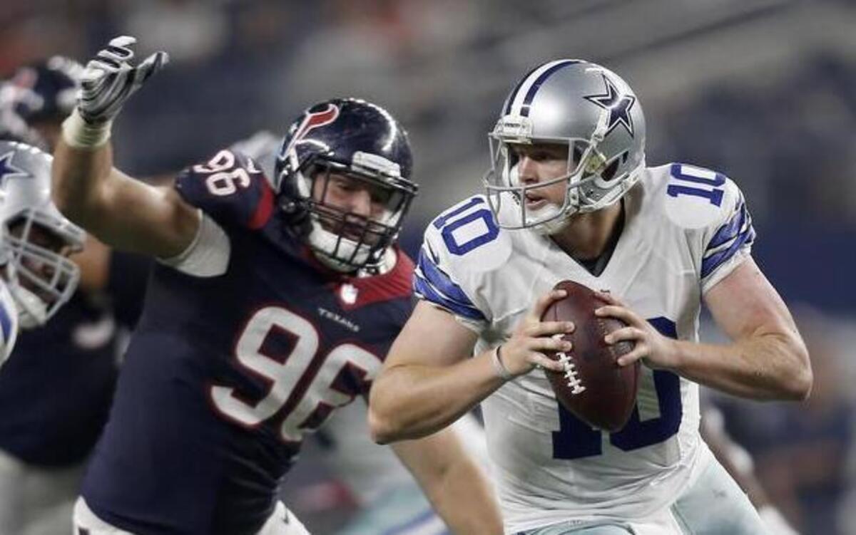 
Cowboys quarterback Dustin Vaughan, right, went 11-of-20 passing for 115 yards Thursday and now waits to see if he made the team for the second year in a row.
