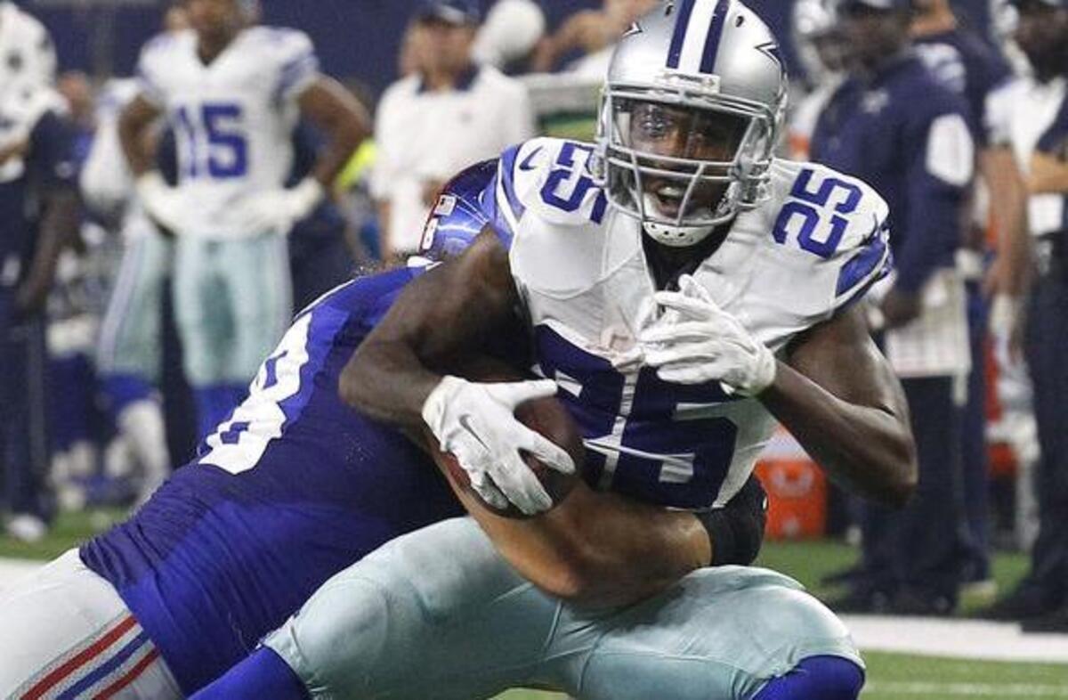 
Running back Lance Dunbar (25) didn’t have a carry against the Giants, but he caught eight passes for 70 yards.
