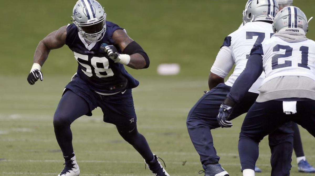 Cowboys DE Damontre Moore (58) will serve a two-game suspension to start this season.