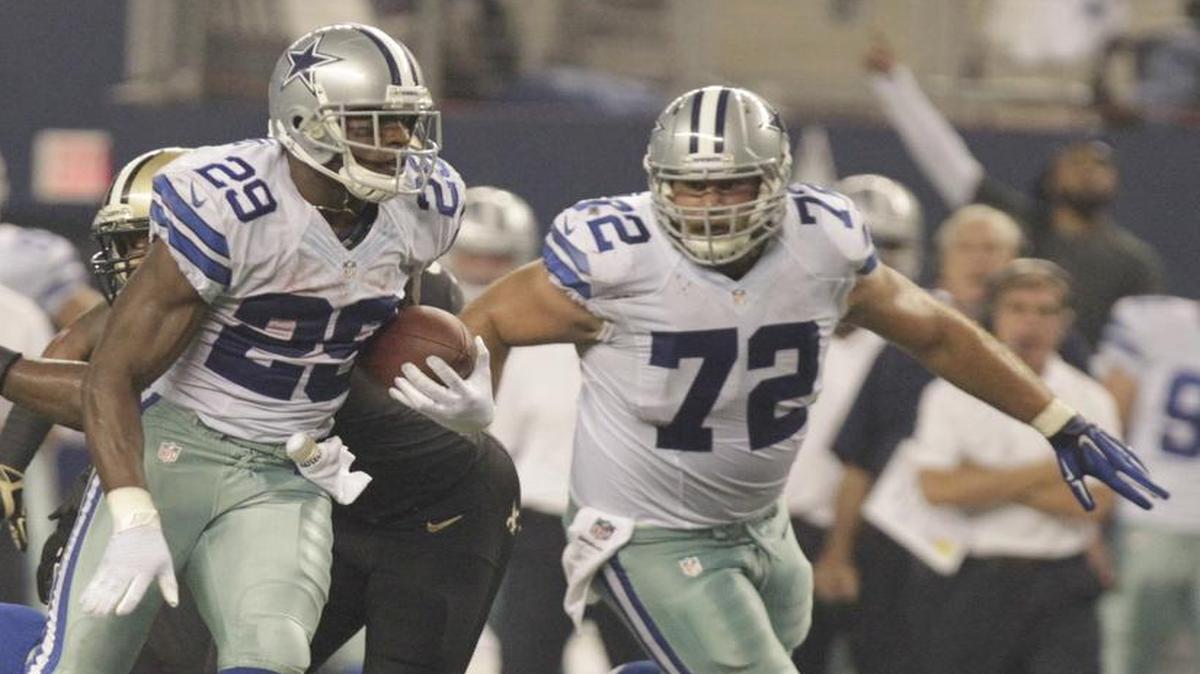 
Travis Frederick escorts DeMarco Murray on a play last season against the Saints.
