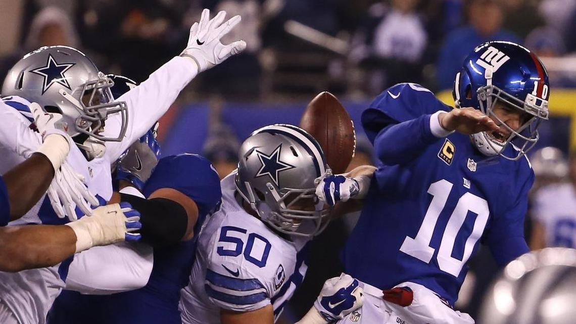 Sean Lee (50) was credited with 22 tackles against the Giants.