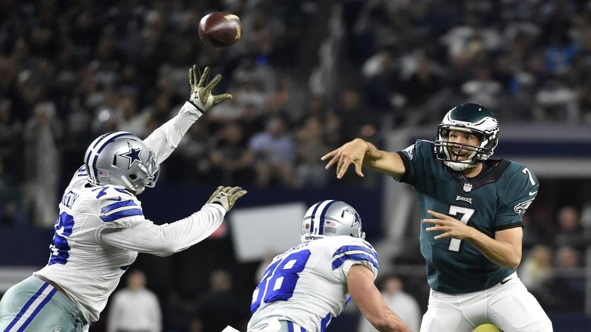 Cowboys defensive end Greg Hardy, left, defending Eagles quarterback Sam Bradford’s pass, had a sack and three tackles Sunday but also committed two penalties and appeared winded at times.