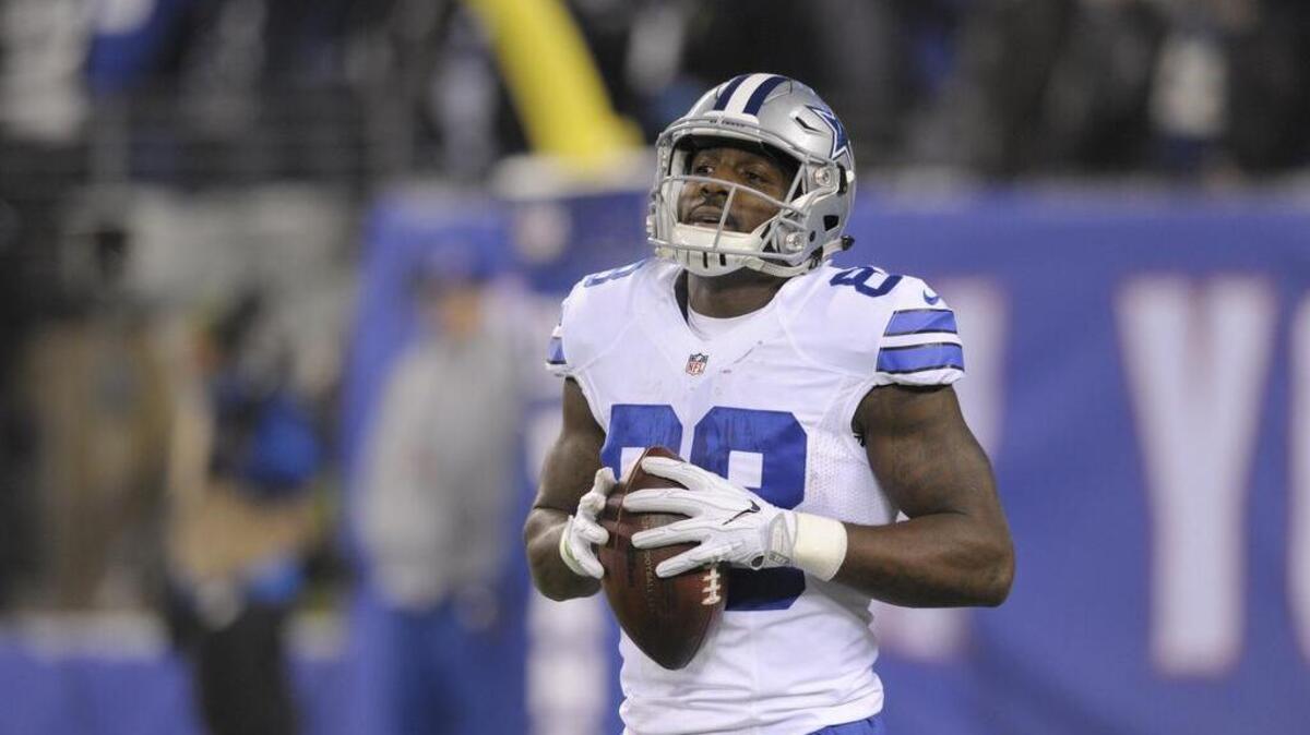 Cowboys receiver Dez Bryant (88) was limited in practice with a back injury.