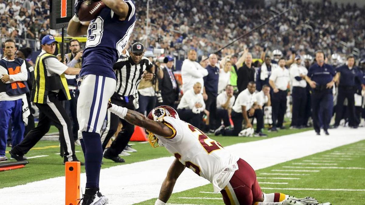 Cowboys receiver Terrance Williams (83) stays in bounds against Washington Redskins cornerback Bashaud Breeland (26) for a touchdown Thursday.