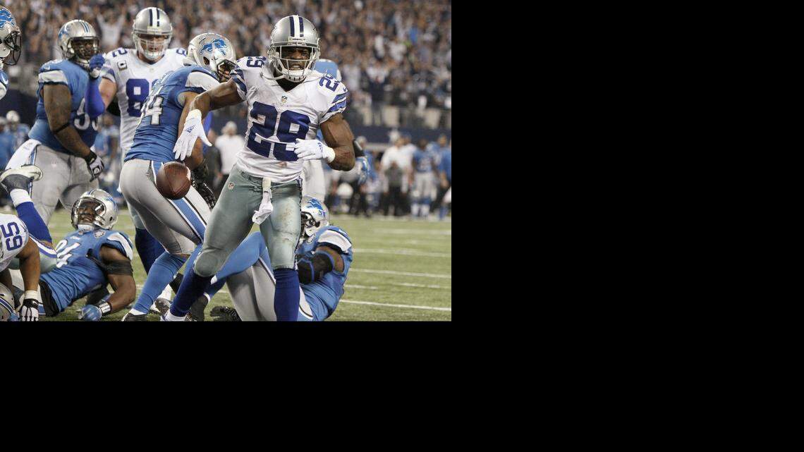
Dallas Cowboys running back DeMarco Murray (29) celebrates a touchdown run during the second half of an NFL wild-card playoff football game against the Detroit Lions. 
