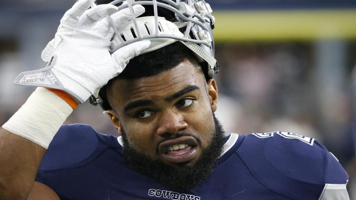 Dallas Cowboys running back Ezekiel Elliott scored on a 4-yard run in the first quarter against the Washington Redskins at AT&T Stadium.