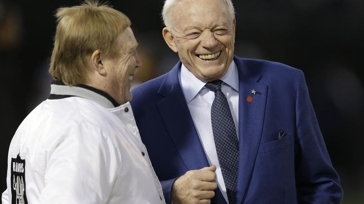 Dallas Cowboys owner Jerry Jones, right, talks with Oakland Raiders owner Mark Davis before Sunday’s NFL game between the Raiders and the Cowboys. Jones is saddened by the scandal that is forcing Carolina Panthers owner Jerry Richardson to sell his franchise.