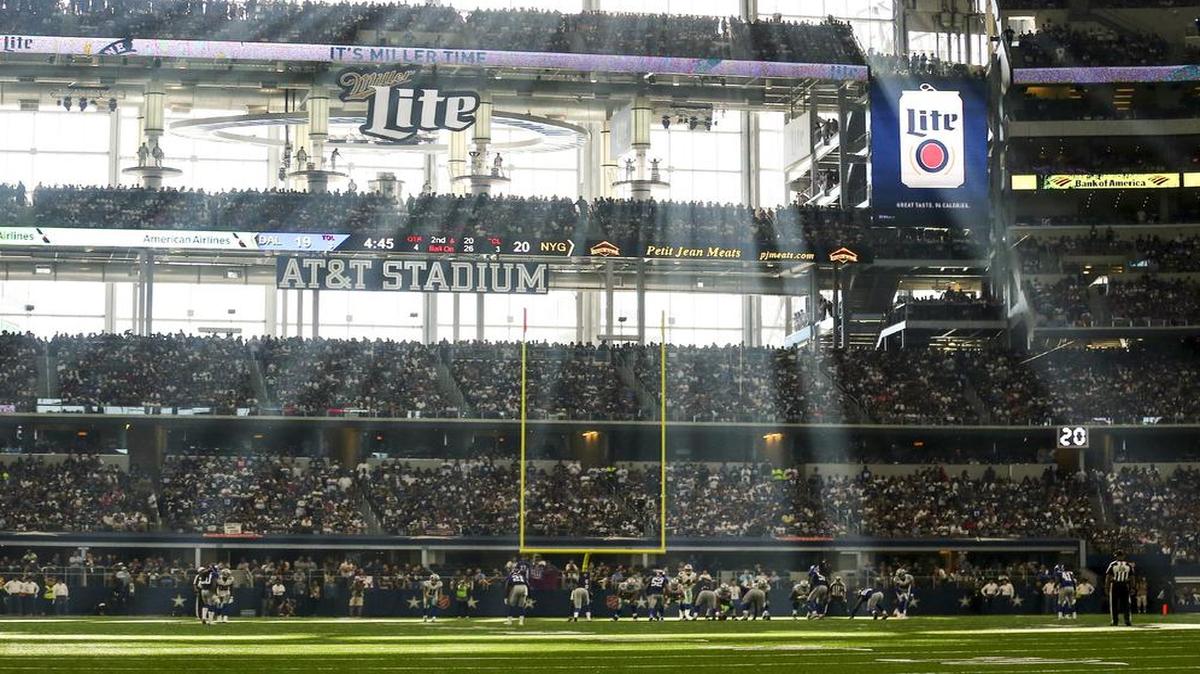 Light filters though the windows onto the field during Sunday’s game between the New York Giants and the Dallas Cowboys at AT&T Stadium in Arlington.