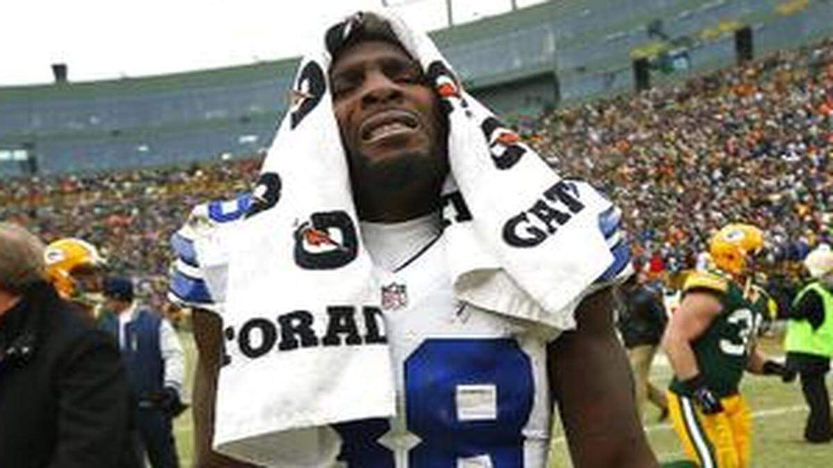 
Dallas Cowboys wide receiver Dez Bryant  leaves the field after the team’s loss to the Packers. The Green Bay Packers defeated the Dallas Cowboys 26-21 in the NFL Divisional Playoffs at Lambeau Field Sunday, January 11, 2015. 
