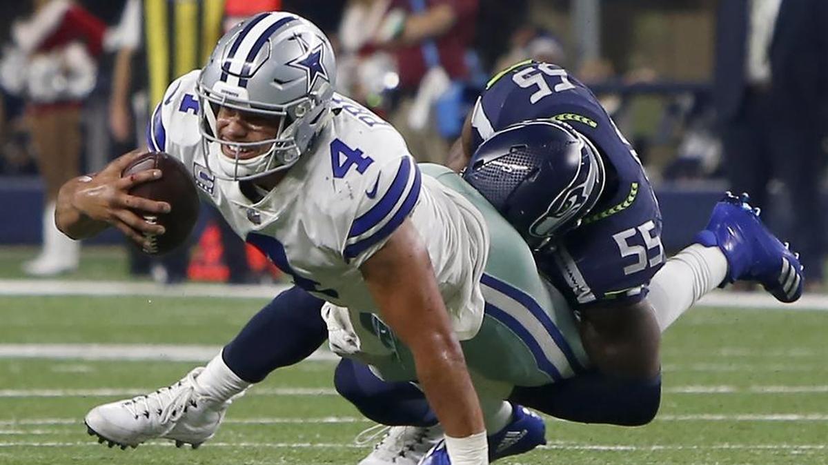 Cowboys quarterback Dak Prescott, sacked by the Seahawks’ Frank Clark on Sunday, has experienced many more pitfalls in his second season after a standout rookie year.