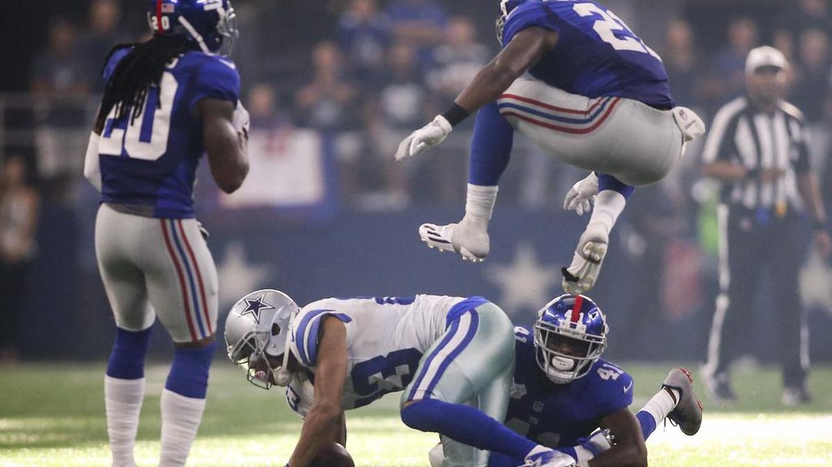 Cowboys wide receiver Terrance Williams (83) is tackled by New York Giants cornerback Dominique Rodgers-Cromartie (41) on the final play of Sunday’s game.