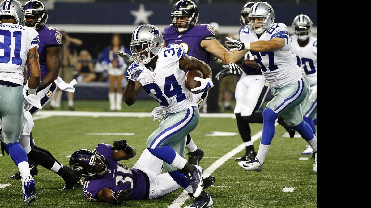 
Ryan Williams, shown in a preseason game last season, hopes to get a chance to run behind the league’s best offensive line.
