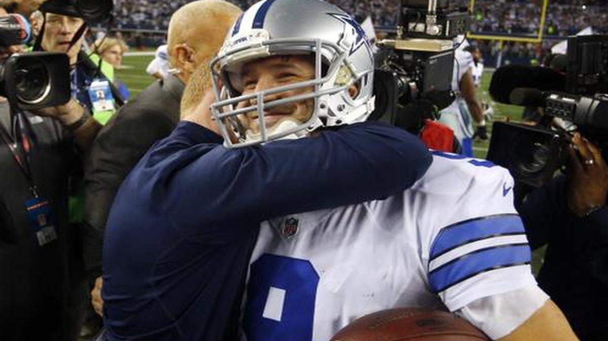 
Dallas Cowboys coach Jason Garrett hugs quarterback Tony Romo after the 24-20 victory over the Detroit Lions. Romo’s legacy would be complete if he can get the Cowboys to the Super Bowl. 
