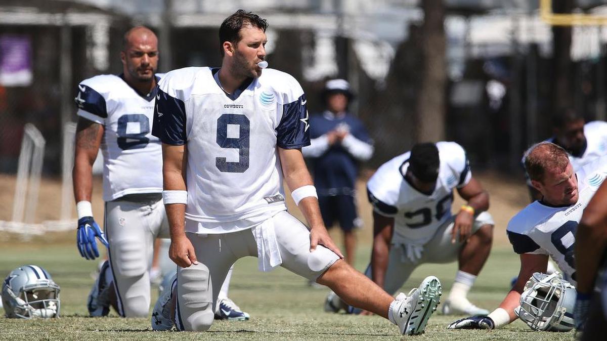 
Dallas Cowboys quarterback Tony Romo, shown stretching Sunday, will sit out Monday’s practice.
