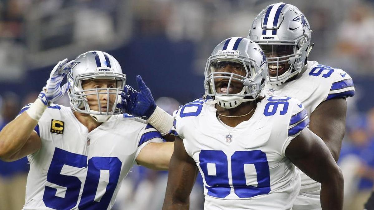 Dallas Cowboys defensive end Demarcus Lawrence, right, was named to his first Pro Bowl earlier this week.