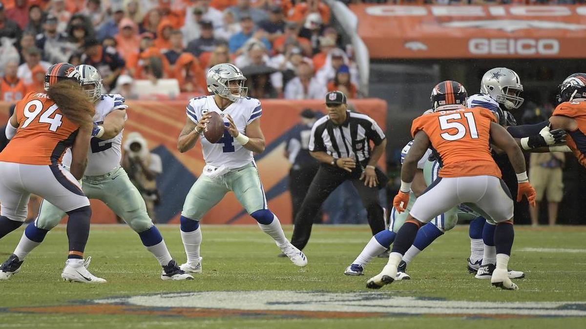 Dallas Cowboys quarterback Dak Prescott threw two touchdowns against Denver, but he was also intercepted twice.