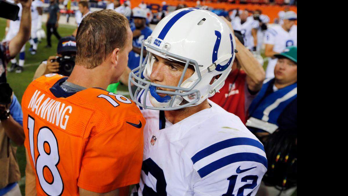 
Peyton Manning, left, and the Broncos will face the Colts and Andrew Luck on Nov. 8 in what might be Manning’s last game in Indianapolis.
