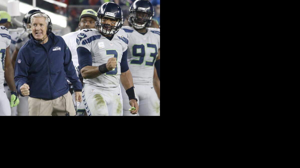 
Seahawks coach Pete Carroll and quarterback Russell Wilson hope to repeat as Super Bowl champs.



