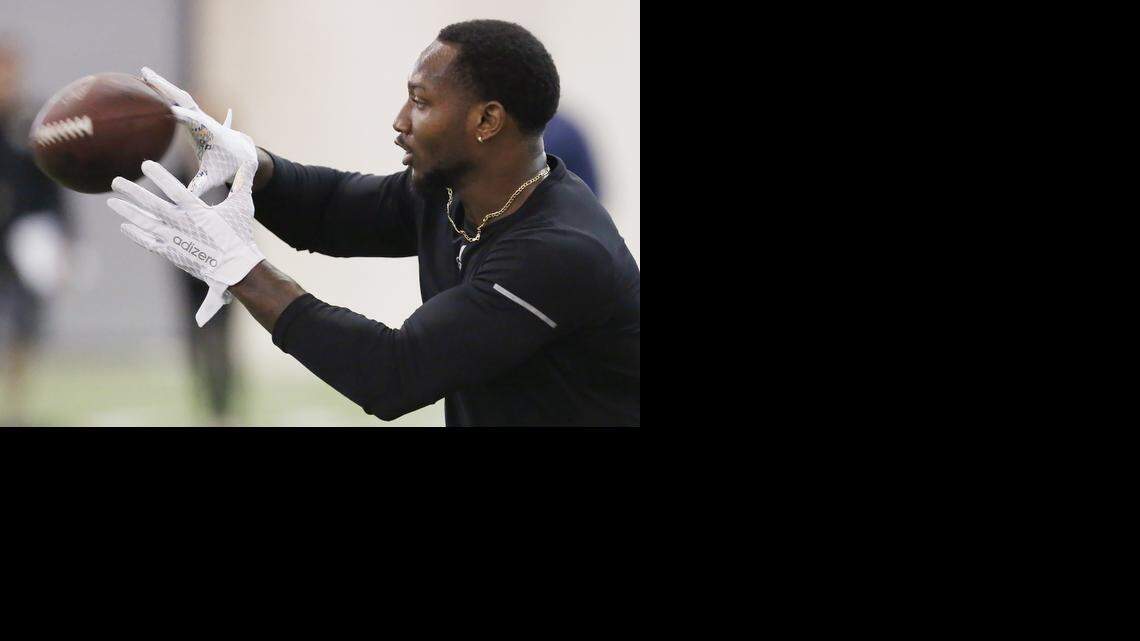 
Former TCU linebacker Paul Dawson catches a pass from a scout during TCU’s Pro Day in Fort Worth on Friday. 

