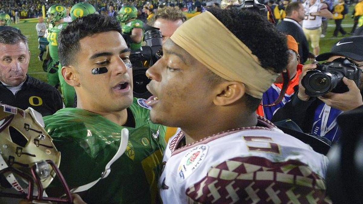 
In the Rose Bowl, Marcus Mariota, left, finished ahead of Jameis Winston, but the order is reversed in Charean Williams’ final mock draft. Neither quarterback star will be present at the draft Thursday night in Chicago.


