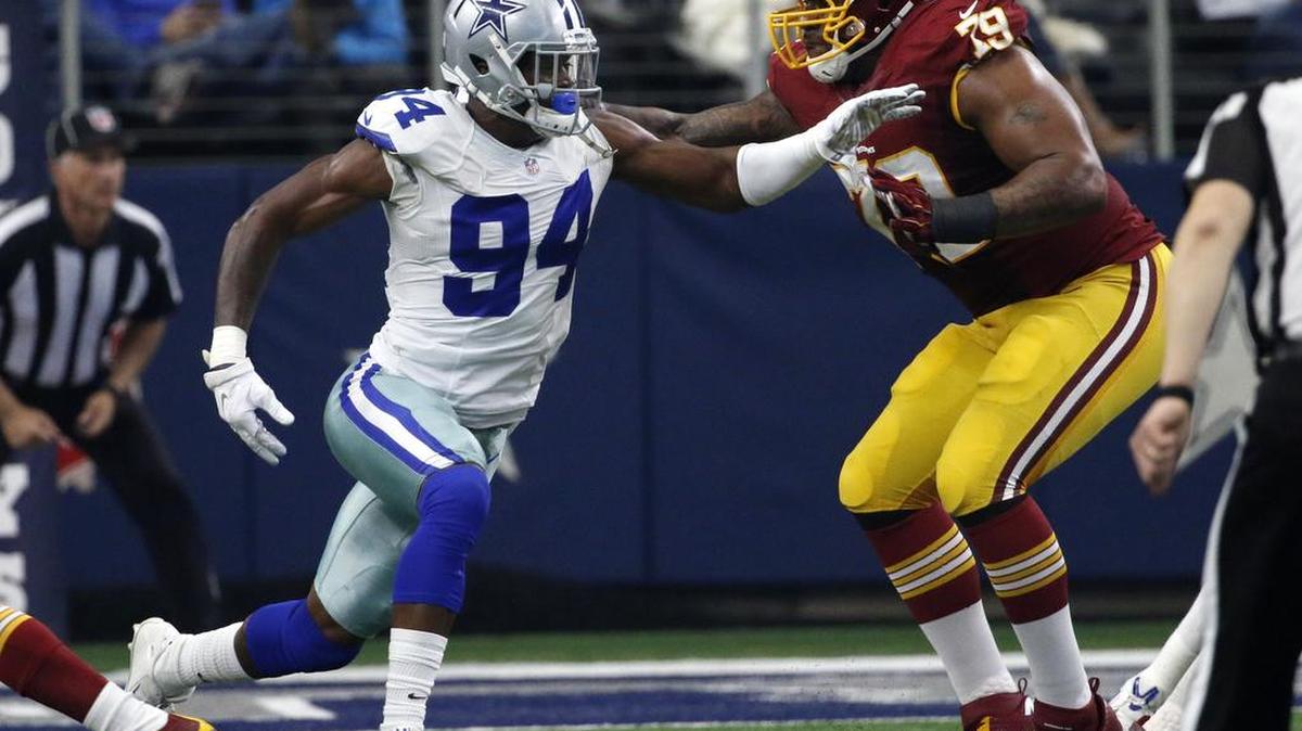 Washington Redskins tackle Ty Nsekhe (79) blocks Dallas Cowboys defensive end Randy Gregory (94) during an NFL football game in Arlington, Texas. Not too long ago, Nsekhe was making $150 a week playing arena football