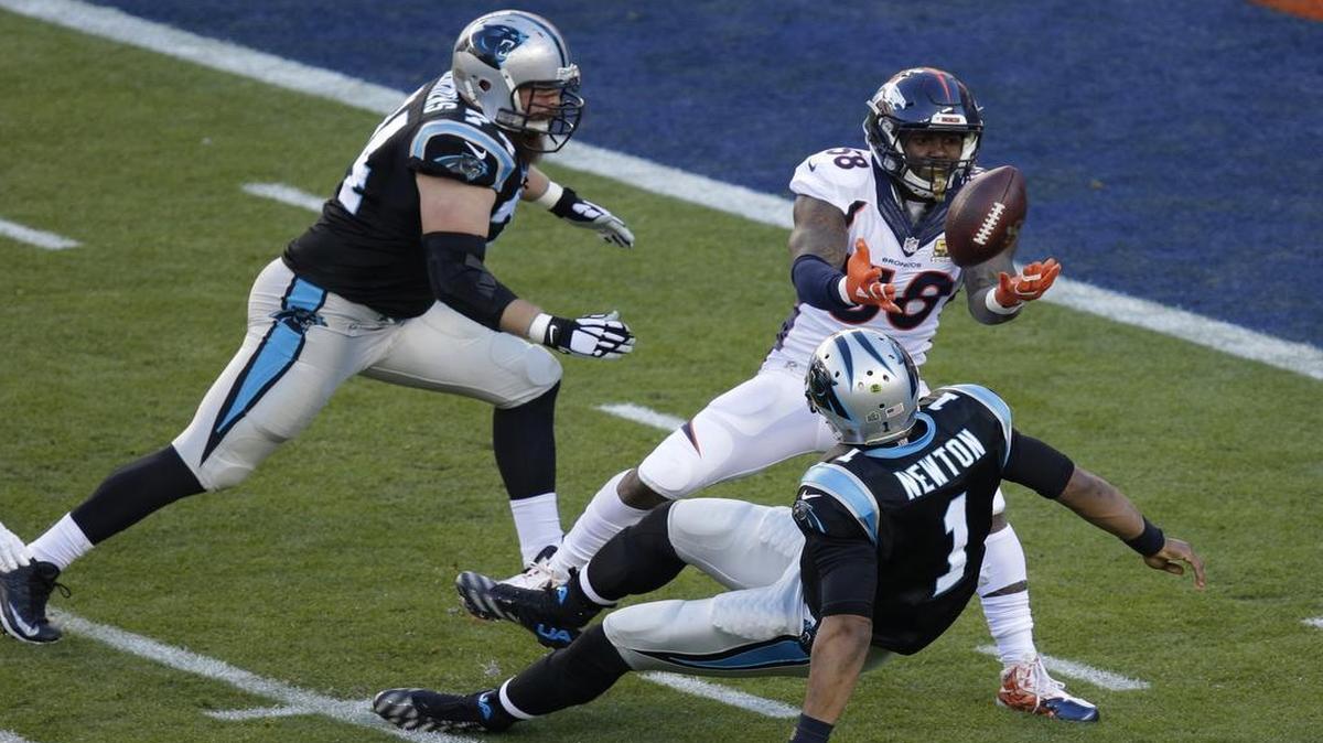Denver Broncos’ Von Miller strips the ball and sacks Carolina quarterback Cam Newton. Malik Jackson recovered the ball in the end zone for a touchdown in the first quarter.