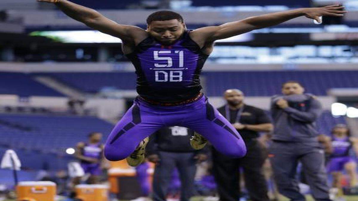 
Kevin White, above, thinks he and safety Chris Hackett can help make TCU known as DBU.



