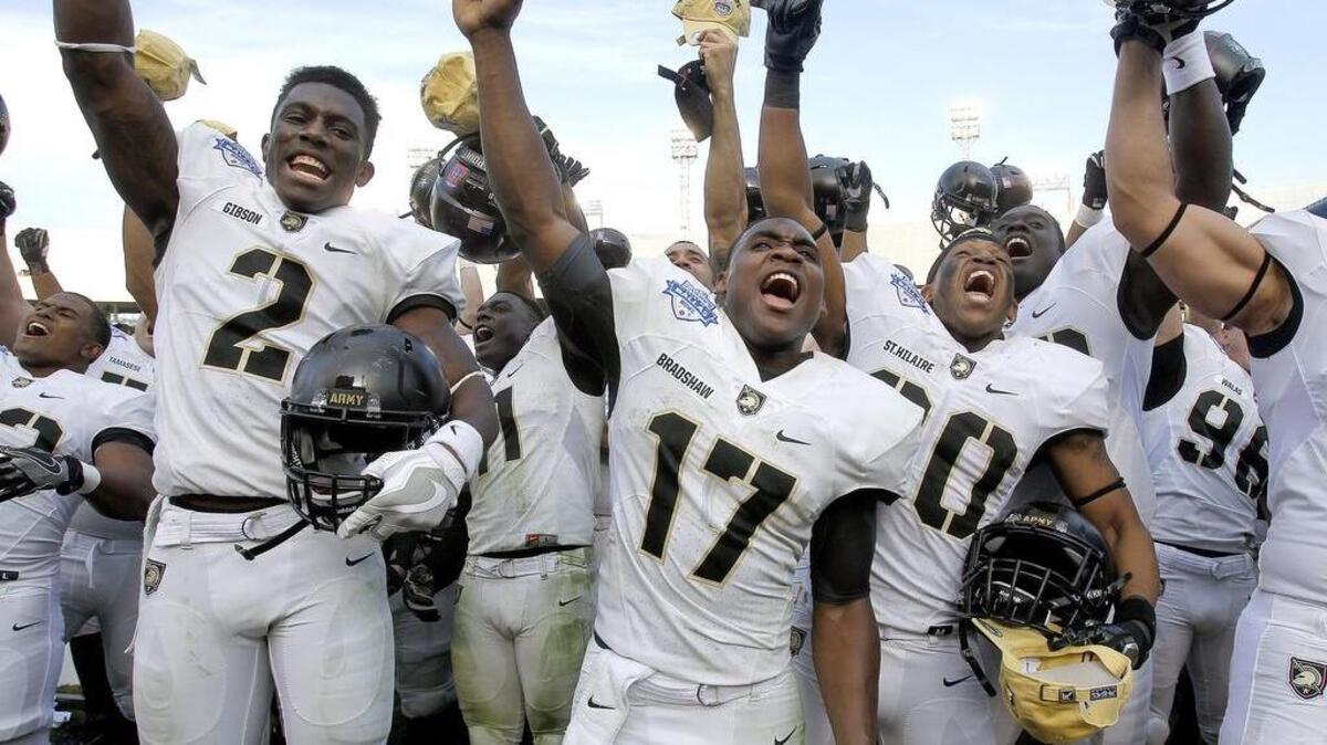 Army players celebrate their win against North Texas after last year’s Heart of Dallas Bowl. The Black Knights have accepted an invitation to play in the Armed Forces Bowl.