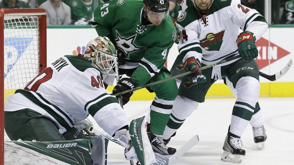 Minnesota Wild goalie Devan Dubnyk, left, gave the Stars fits last season in the playoffs. This season, Dubnyk leads the NHL in goals-against average (1.77), save percent (.940) and shutouts (5). The Wild visit the Stars at 7 p.m. Saturday on FSSW.