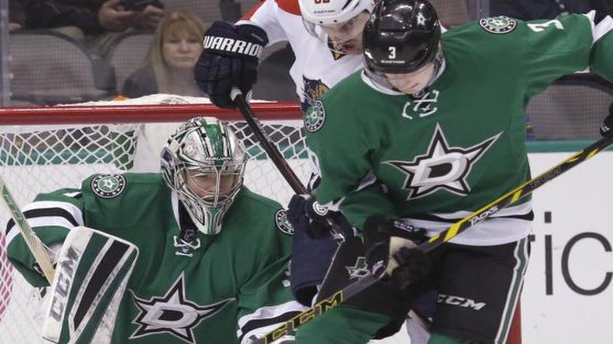 
Dallas Stars goalie Kari Lehtonen (32) and defenseman John Klingberg (3) defend the goal against Florida Panthers left wing Tomas Kopecky (82) during the first period Friday in Dallas. 
