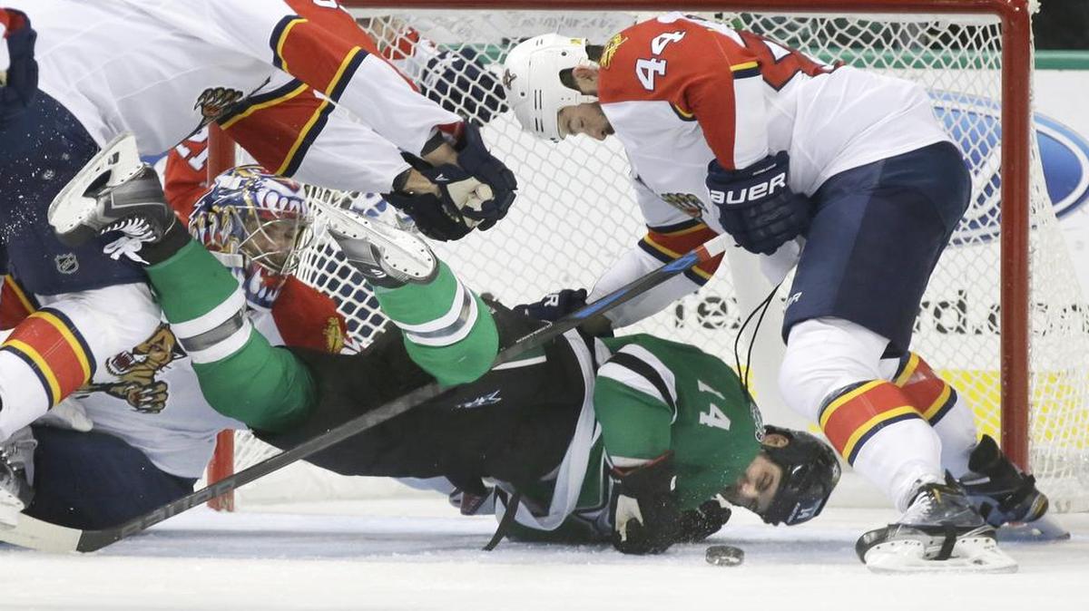 Stars left wing Jamie Benn, center, scored both Dallas goals, but the Panthers didn’t make it easy for him.