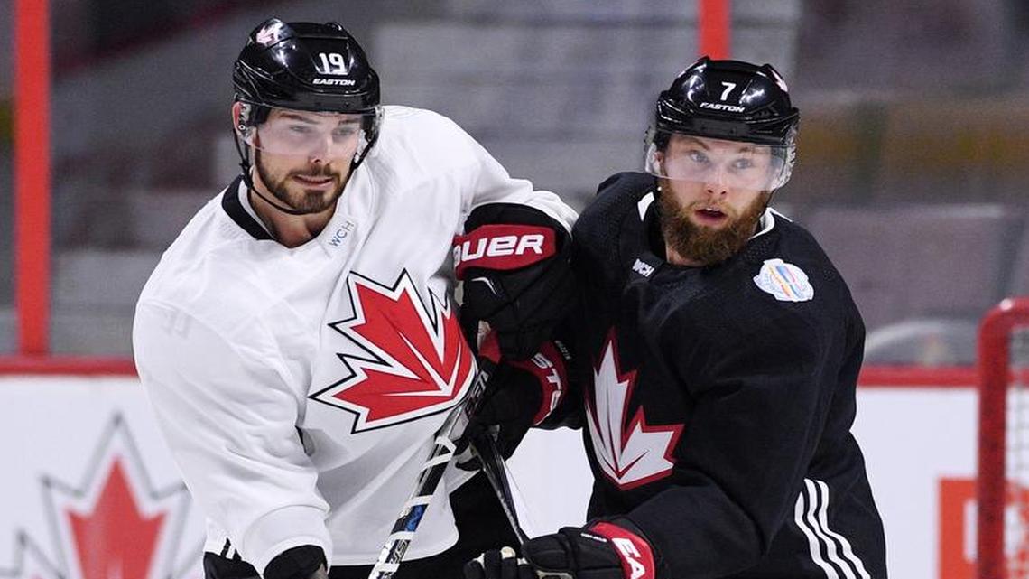Tyler Seguin, left, practicing with Team Canada teammate Jake Muzzin on Sept. 7, suffered a fractured heel in Canada’s exhibition game against the United States on Sept. 9. The Dallas Stars center will be re-evaluated in a week.