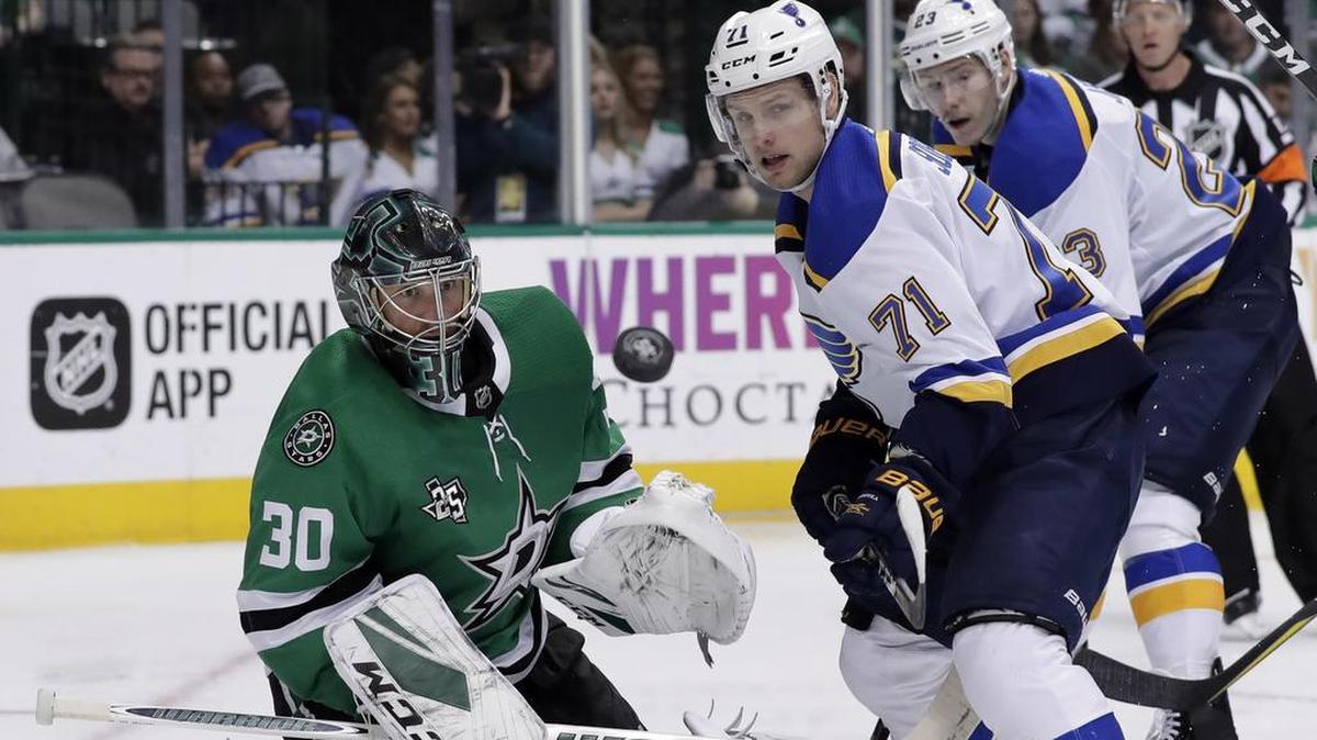 Stars goalie Ben Bishop (30), St. Louis Blues center Vladimir Sobotka (71) and right wing Dmitrij Jaskin (23) watch an airborne puck after Bishop blocked a shot by Sobotka in the second period of Saturday’s game in Dallas.