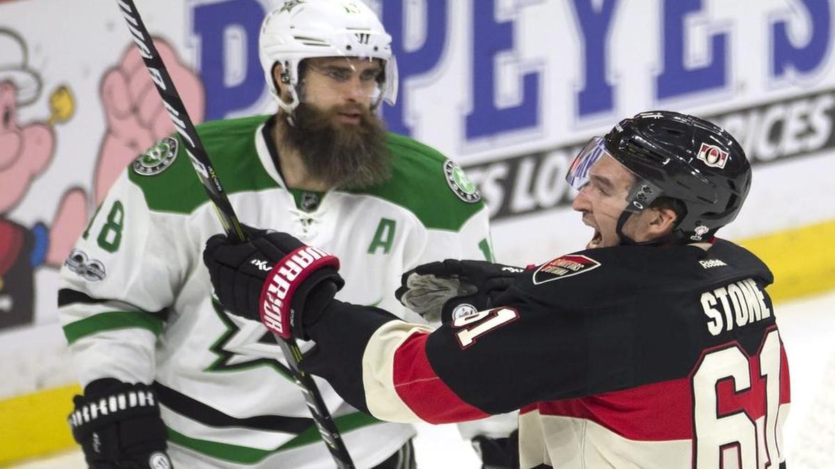 Dallas Stars right wing Patrick Eaves (18) looks on as Ottawa Senators right wing Mark Stone (61) celebrates his goal during the third period Thursday.
