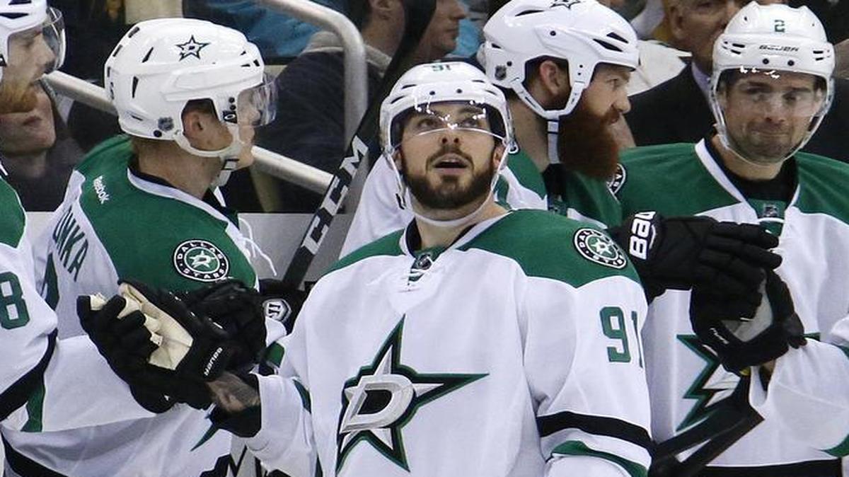 Dallas Stars forward Tyler Seguin (91) watches a replay of his goal as he celebrates with teammates during the second period of against the Pittsburgh Penguins in Pittsburgh, Thursday, Dec. 1, 2016. The Stars lost 6-2 but Seguin has been finding his shot again after a goal drought.