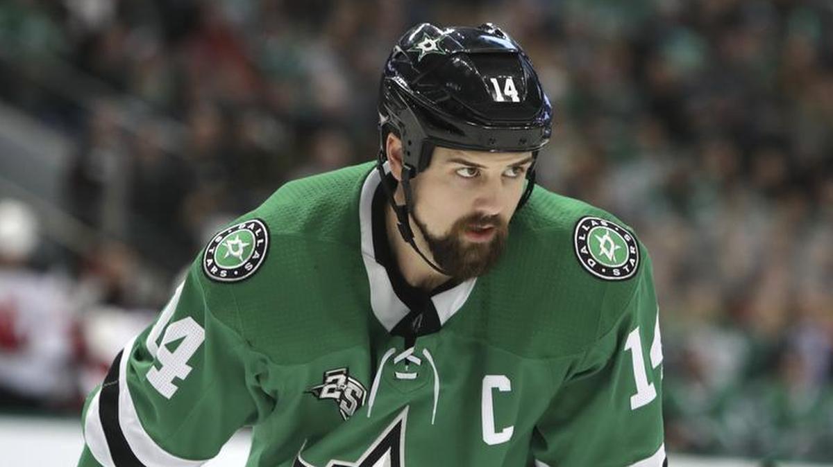 Dallas Stars left wing Jamie Benn lines up during the first period of an NHL hockey against the New Jersey Devils game in Dallas, Thursday, Jan. 4, 2018.