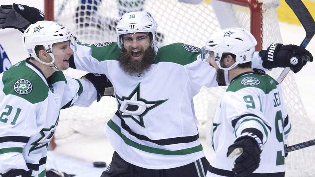 Dallas Stars right wing Patrick Eaves, middle, has a team-leading 12 goals in 34 games played this season. Eaves, above celebrates after a goal by Antoine Roussel on Nov. 13 in Vancouver. Center Tyler Seguin is at right. The Stars play at the Arizona Coyotes on Tuesday night.