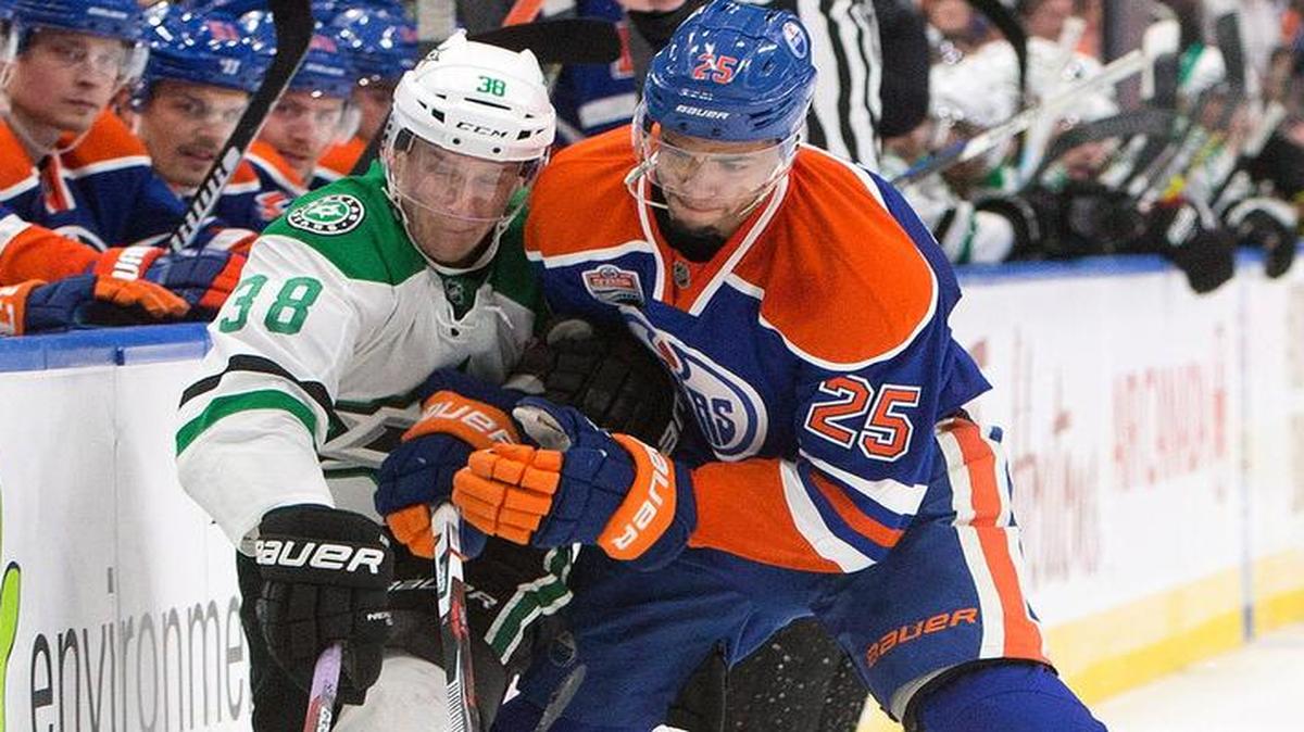 Dallas Stars’ Lauri Korpikoski (38) and Edmonton Oilers’ Darnell Nurse (25) compete for the puck during the third period of an NHL hockey game Friday, Nov. 11, 2016, in Edmonton, Alberta.