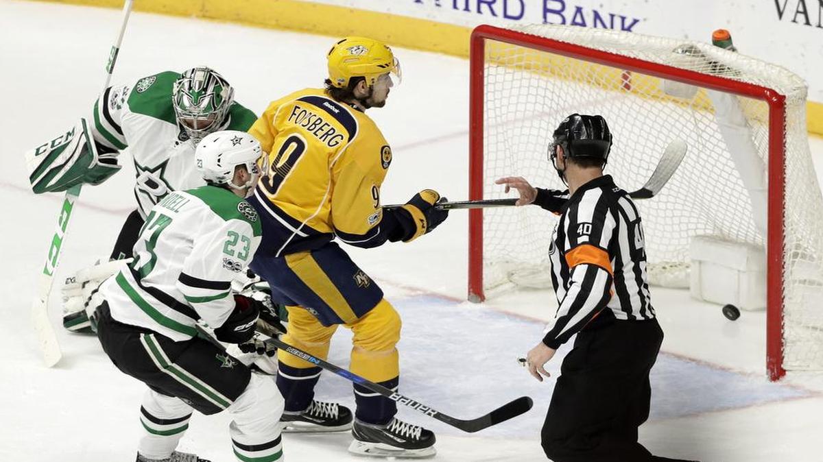 Nashville Predators left wing Filip Forsberg scores the winning goal against Dallas Stars goalie Kari Lehtonen, left, during the third period Sunday.