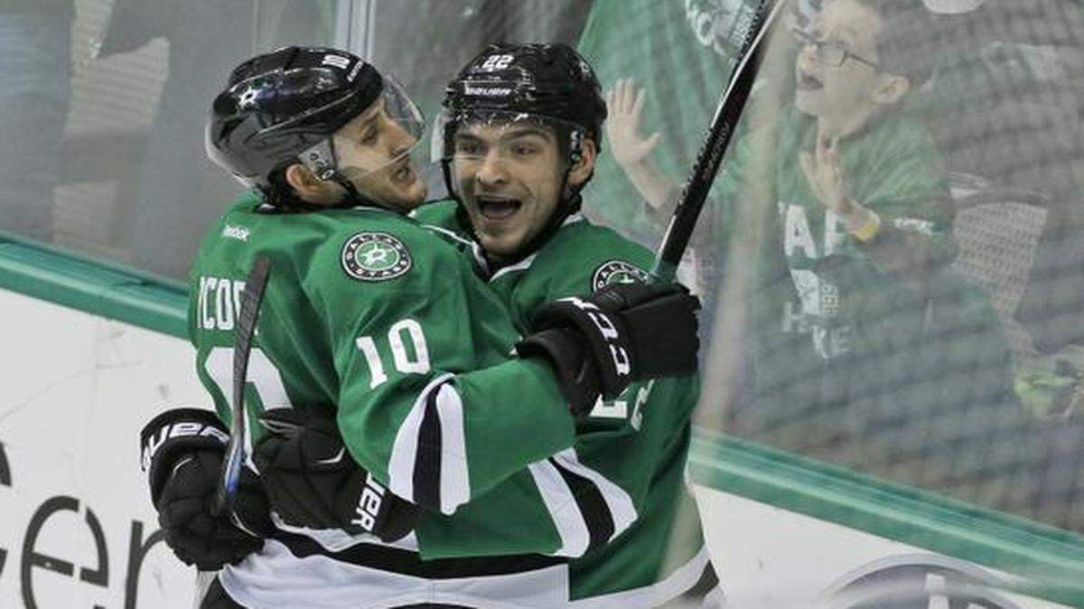 Stars center Shawn Horcoff, right, celebrates his second-period goal Saturday night with teammate Colton Sceviour.<137> during the second period. of an NHL hockey game against the New Jersey Devils, Saturday, Dec. 13, 2014, in Dallas. (AP Photo/LM Otero)<137>