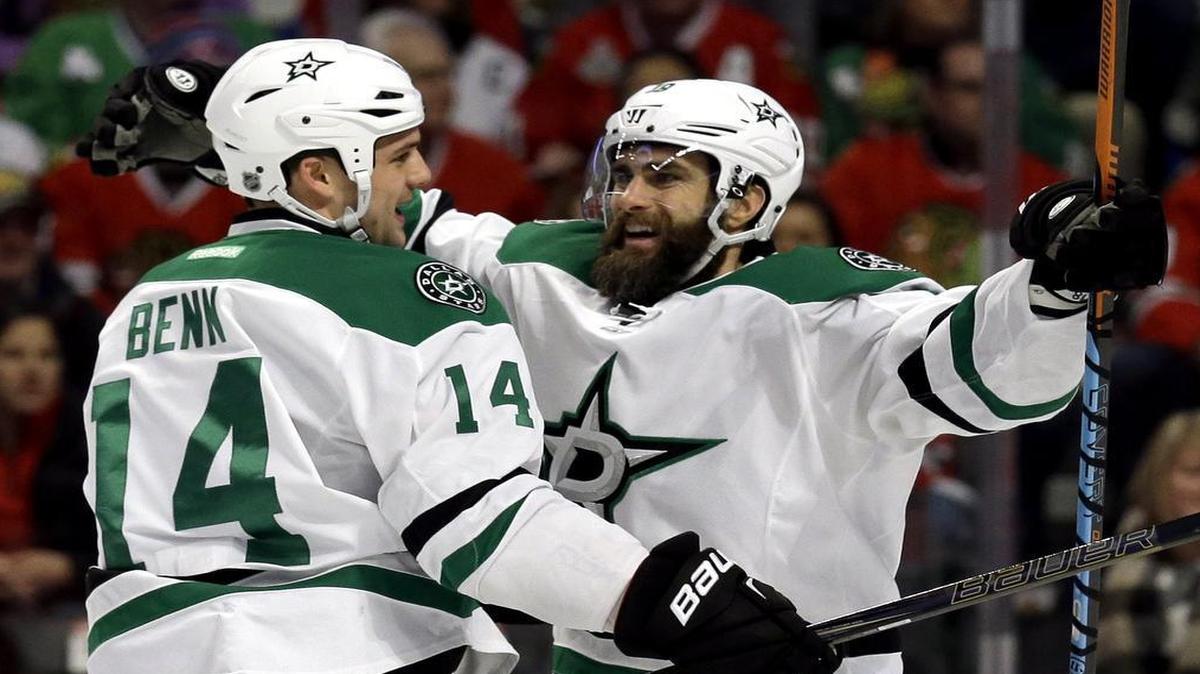 Stars right wing Patrick Eaves, right, is congratulated after his first goal by Jamie Benn.