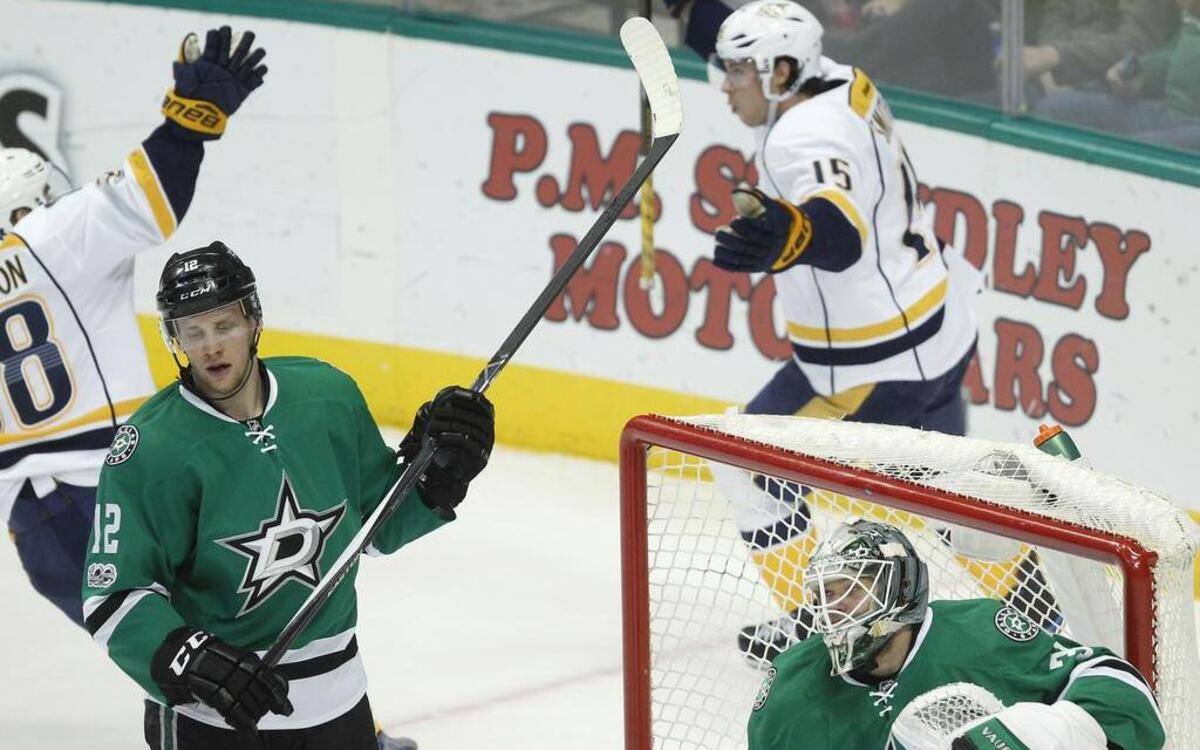Dallas Stars center Radek Faksa (12) and goalie Antti Niemi (31) react after a goal by Nashville Predators right wing Craig Smith (15) during the first period of Thursday’s game in Dallas.