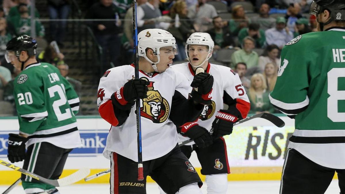 Dallas Stars’ Cody Eakin (20) and Ales Hemsky, right, skate away as Ottawa Senators’ Jean-Gabriel Pageau (44) celebrates his goal in the second period of an NHL hockey game in Dallas on Wednesday.